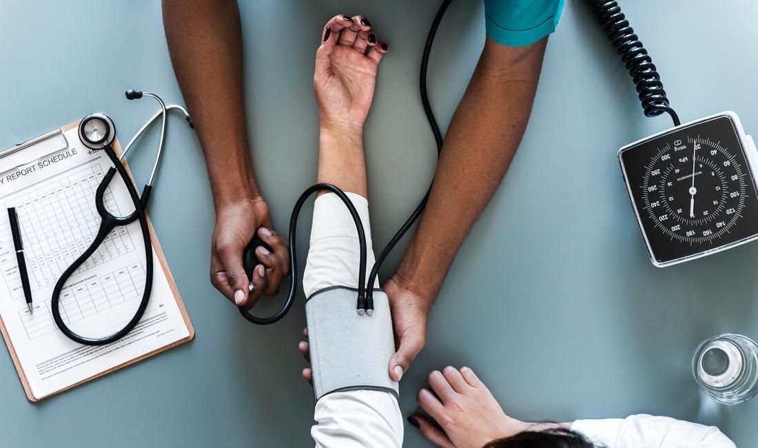 Doctor Checking Heart Rate and Pulse